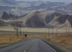 Peruvian landscape with highway heading into the Andes